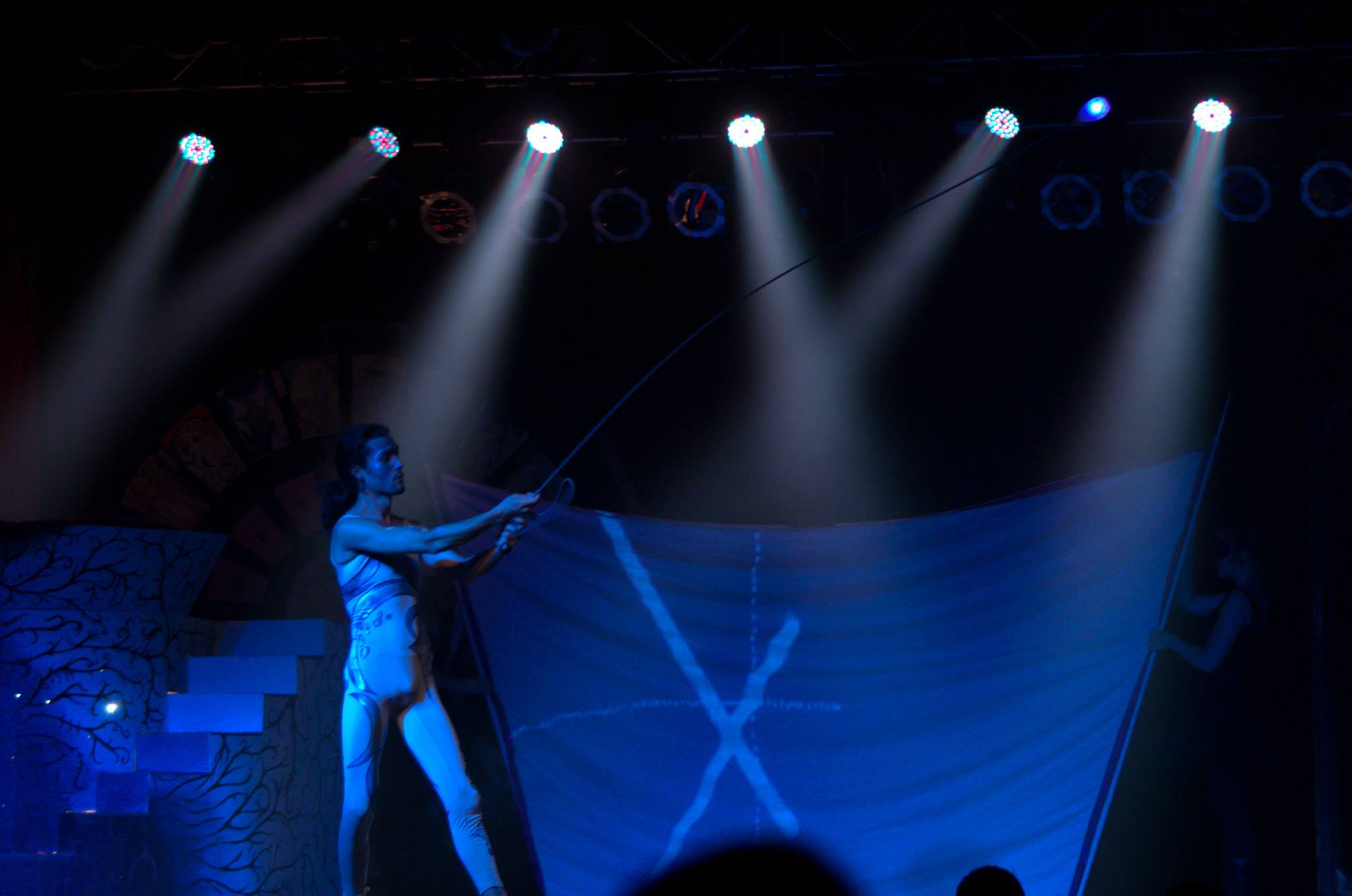 Tarocco Dancer interacting with projection screen onstage